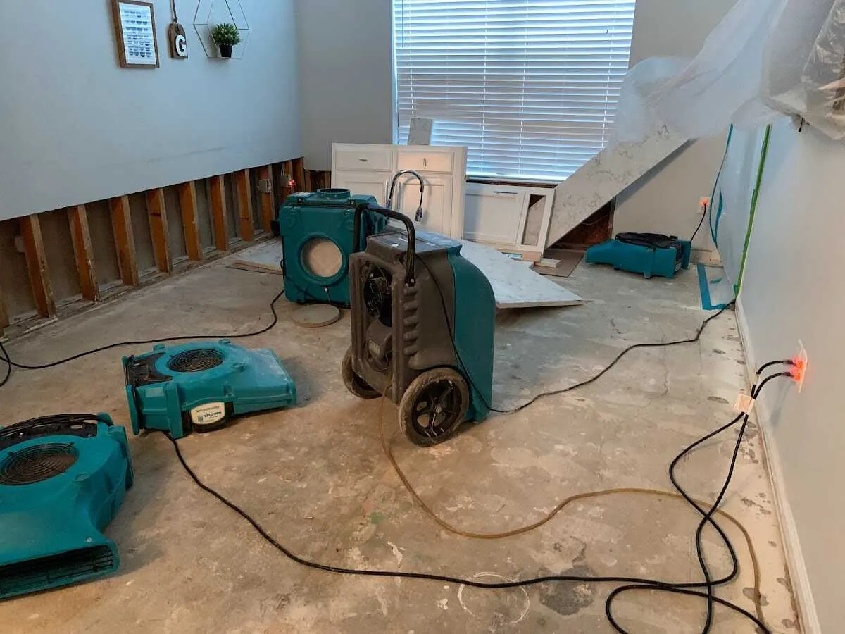 Dehumidifier in flood-cut room for Water Damage Restoration in Holbrook